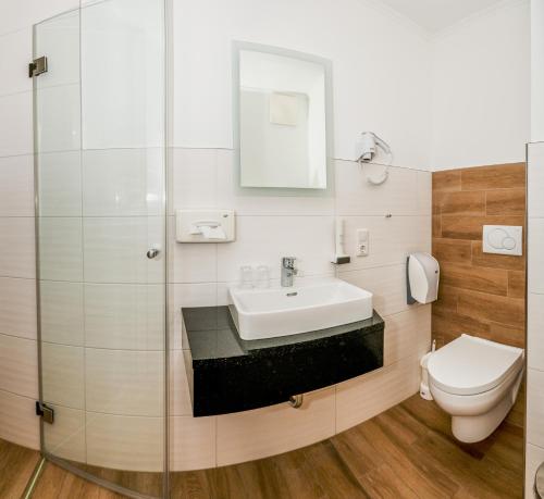 Salle de bains dans l'établissement Panorama Hotel Traunstein