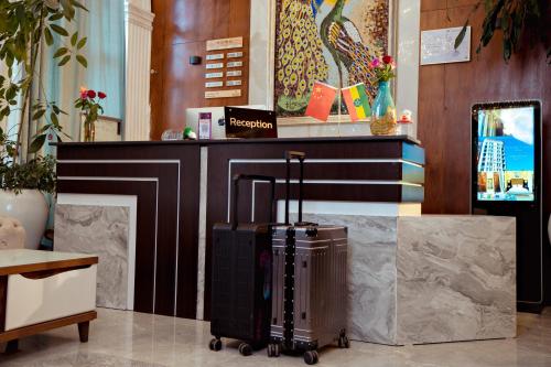 a lobby with a luggage cart in a room at 泊悦国际大酒店 BoYue Hotel in Addis Ababa Bole International Airport