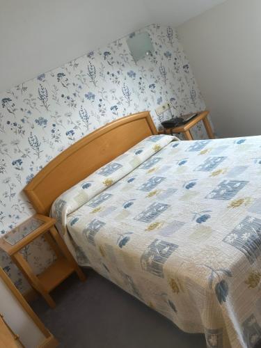Ένα ή περισσότερα κρεβάτια σε δωμάτιο στο Hotel La Guindal