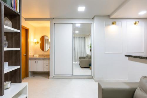 Phòng tắm tại PALMAS EXPERIENCE - FLAT NASCER DO SOL, no centro, vista serra!