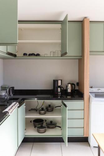 Dapur atau dapur kecil di Lou Suítes - Suíte 13 - Simples, Confortável e Perfeito
