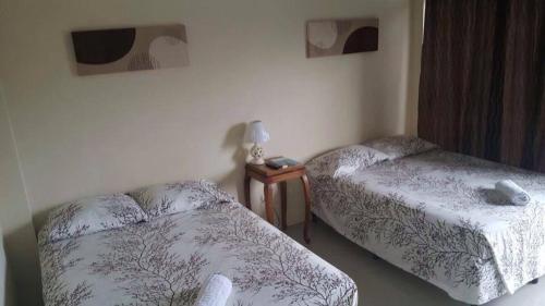 Postel nebo postele na pokoji v ubytování Cabinas Gosen