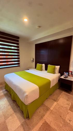 Katil atau katil-katil dalam bilik di Hotel del Pescador