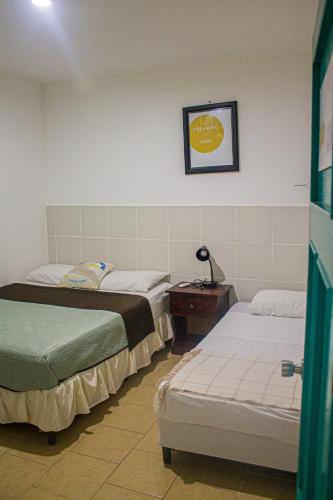 Voodi või voodid majutusasutuse Tapihouse San Juan Del Sur toas