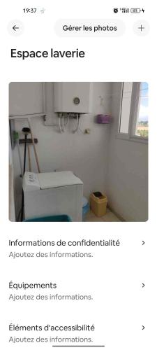 a screenshot of a room with a white room with a window at Marwan in Tunis