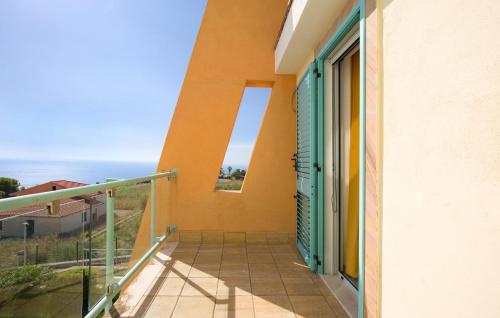 a balcony with a view of the ocean at Amazing Home In Belmonte Calabro in Belmonte Calabro