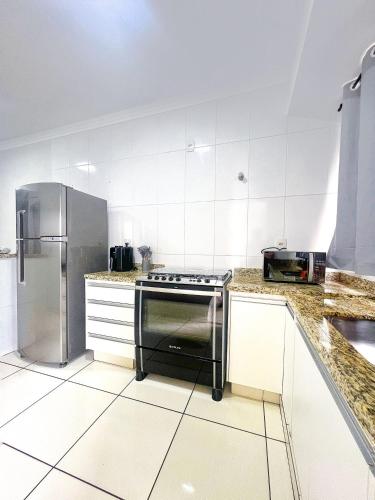 Dapur atau dapur kecil di Apê-202 |Ar, Garagem, Suíte | Unipam e Parque Expo