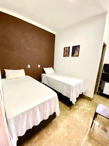 Katil atau katil-katil dalam bilik di Hotel Uirapuru 02