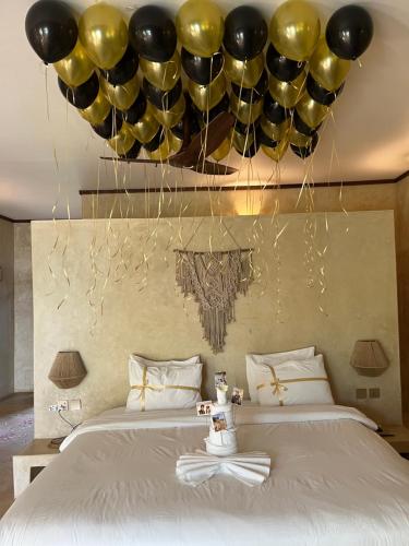 Postel nebo postele na pokoji v ubytování Safaya Luxury Villas - Adults only