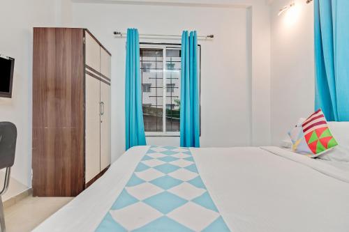 Ένα ή περισσότερα κρεβάτια σε δωμάτιο στο Super Hotel O Pioneer