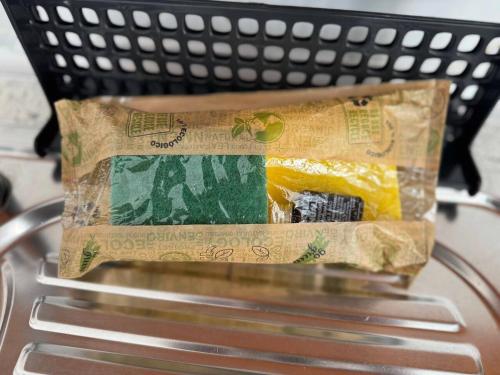 a bag of money sitting on top of a chair at Murdeira V17 RC by RPG Group in Beirona