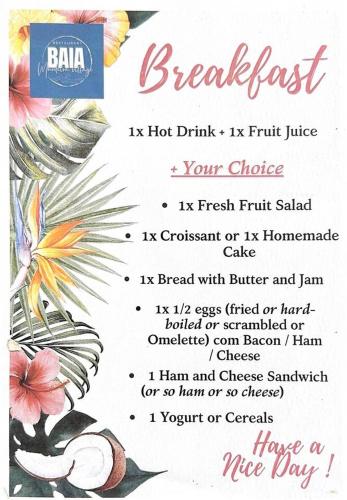 a menu for a restaurant with a bird and flowers at Murdeira V17 RC by RPG Group in Beirona