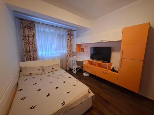 Ένα ή περισσότερα κρεβάτια σε δωμάτιο στο Apartament cu 3 camere in Militari Residence
