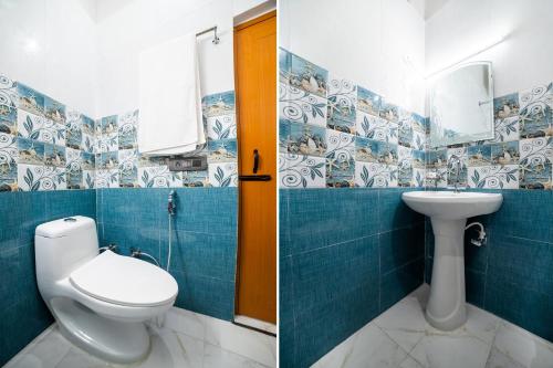 a bathroom with a toilet and a sink at Hotel O Home Gautam Homestay in Dehradun