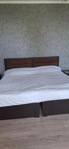 Postel nebo postele na pokoji v ubytování კერძო სახლი