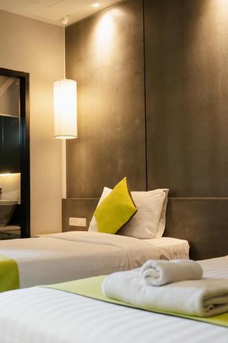 Katil atau katil-katil dalam bilik di 3Season Hotel