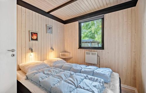 Postel nebo postele na pokoji v ubytování Holiday Home Hejrevænget Hemmet X
