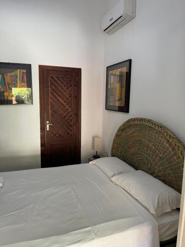 Ένα ή περισσότερα κρεβάτια σε δωμάτιο στο Villa Benedetta
