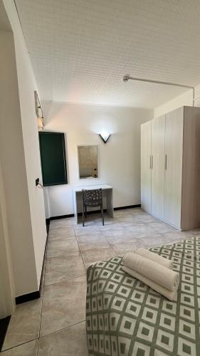 Ένα ή περισσότερα κρεβάτια σε δωμάτιο στο Hotel Il Gabbiano