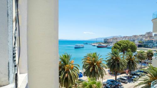 a view of the ocean from a building at Andy Apartments in Sarandë