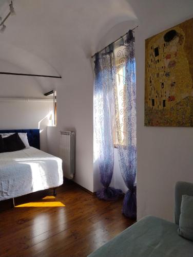Postel nebo postele na pokoji v ubytování Antico Arco