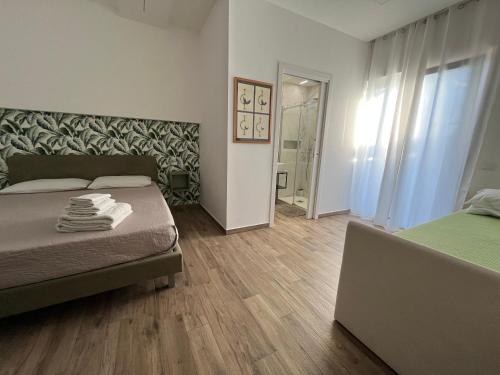 Postel nebo postele na pokoji v ubytování B&B CI.VICO14