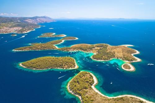 an island group of islands in the water at App Damiani in Oprtalj
