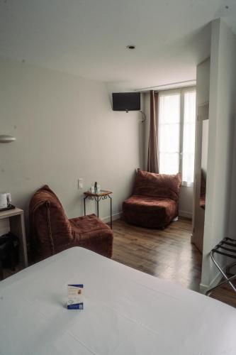 Χώρος καθιστικού στο LOGIS -Hotel & Restaurant de la Place