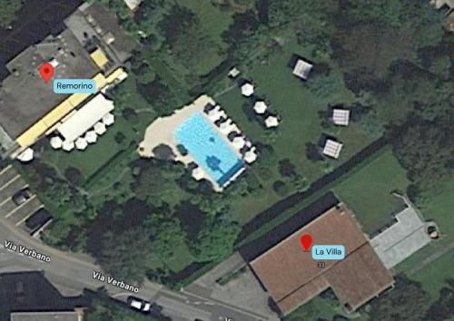 a map of a parking lot with buildings and a pool at LA VILLA - by Hotel Remorino in Locarno