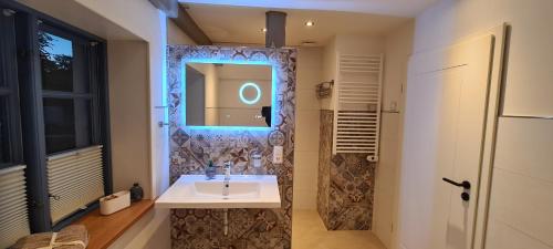 Ένα μπάνιο στο Ferienhaus Watt'n Glück