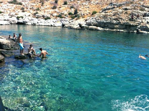 a group of people in the water in a river at RELAX WITH SEA VIEW No 1!!!! in Varkiza