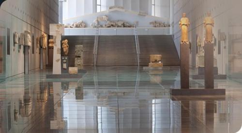 a museum with a bunch of statues on display at RELAX WITH SEA VIEW No 1!!!! in Varkiza