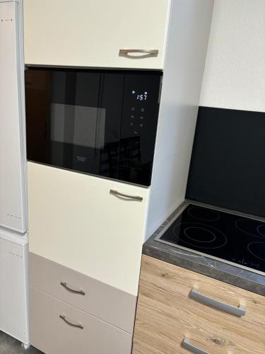 Kuchyň nebo kuchyňský kout v ubytování Luna Apartmán