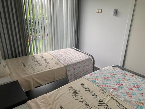 Postel nebo postele na pokoji v ubytování Modern pool home AVORH