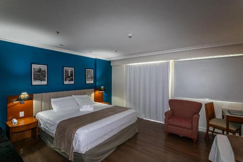 Postel nebo postele na pokoji v ubytování Hotel bourbon residente