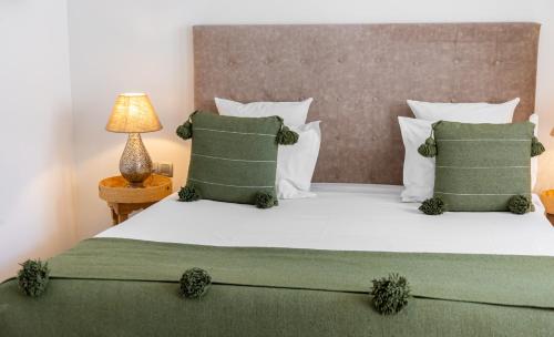 Letto o letti in una camera di Riad Dar Blanche & Spa