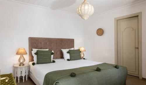 Letto o letti in una camera di Riad Dar Blanche & Spa