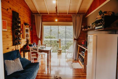 Χώρος καθιστικού στο Pousada Quinta das Araucarias