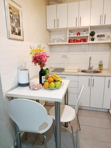 Кухня или мини-кухня в Urban Garden Apartments - Iris
