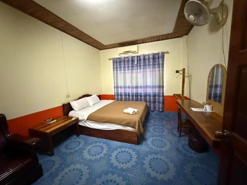 Katil atau katil-katil dalam bilik di Oudomphone Guesthouse 2