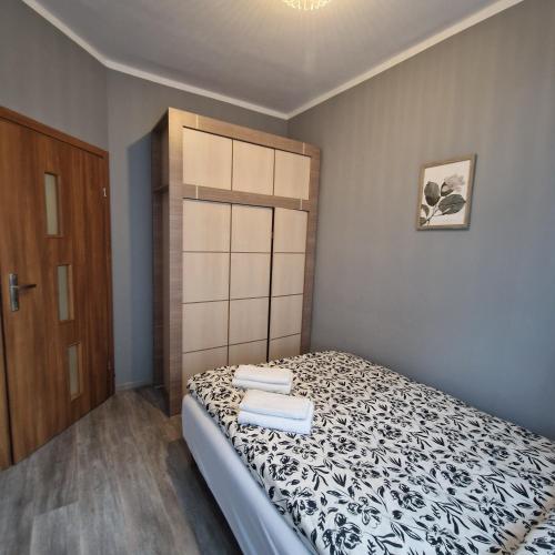 Postel nebo postele na pokoji v ubytování Apartament Anna