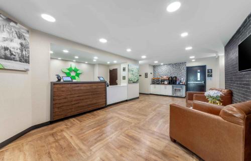a lobby of a hospital with a couch and a counter at Extended Stay America Premier Suites - Miami - Airport - Doral - 87th Avenue South in Miami