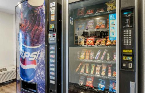 a vending machine filled with lots of drinks and snacks at Extended Stay America Select Suites - Indianapolis - Lawrence in Fishers