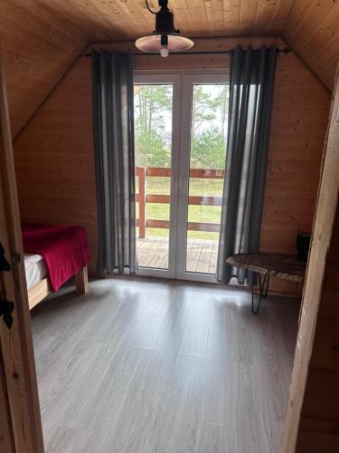 Postel nebo postele na pokoji v ubytování Górska chata na Kaszubach - balia na wyłączność, sauna, klimatyczne miejsce