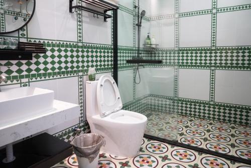 Salle de bains dans l'établissement Foshan Old Street House Shunde Qinghui Garden Branch