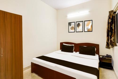 Postel nebo postele na pokoji v ubytování Super Collection O Thousand Lights Chennai