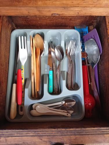 a tray with forks and spoons and utensils at "Arte en el desván" Rustic loft - Desván rústico in Tenancingo de Degollado