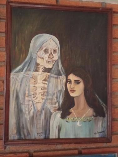 a painting of a skeleton and a woman at "Arte en el desván" Rustic loft - Desván rústico in Tenancingo de Degollado
