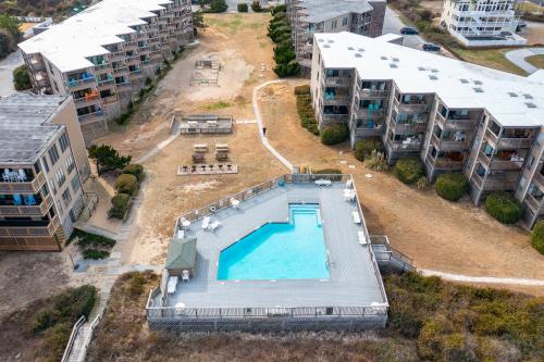 an aerial view of an apartment complex with a swimming pool at C323C - Keep On Duckin' in Duck