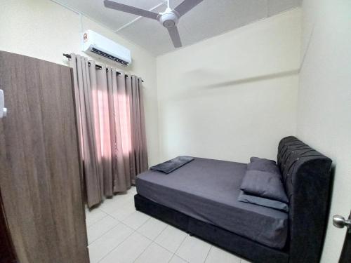 Ένα ή περισσότερα κρεβάτια σε δωμάτιο στο DC Garden Homestay - wifi, netflix